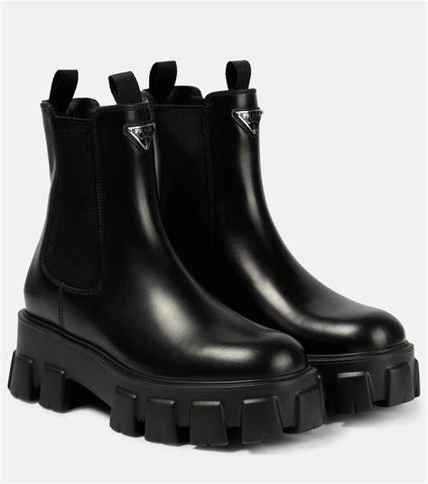 Prada Monolith Leather Chelsea Boots .